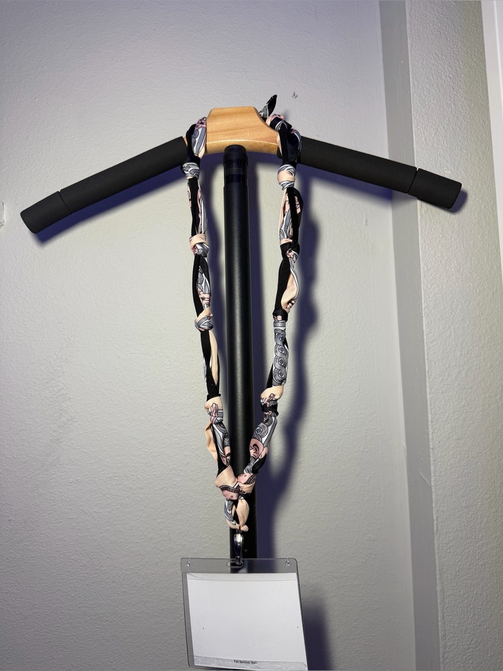 Silk-Twilly Pink and Black tied onto a leather lanyard holder/cell phone cord.
